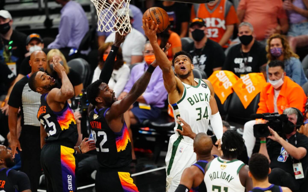 雄鹿多点开花险胜太阳贏得赛点 再胜一战NBA称王